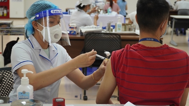 More than 140,000 workers in HCMC get two vaccine shots